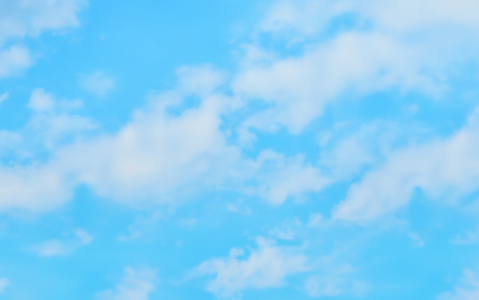 Blue sky with scattered clouds